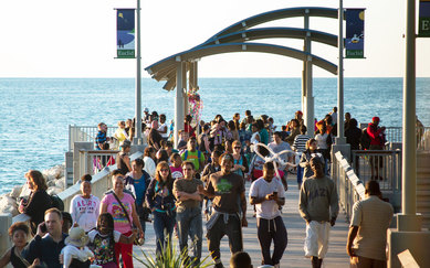 The adverse effects of an already altered climate continue to intensify—from unprecedented heat waves, droughts, and wildfires to catastrophic flooding and habitat loss. These shocks and stresses are having a growing impact on our communities – with an undeniable link between poverty, health, and climate vulnerabilities. SmithGroup seeks to emphasize an intersectional framework for resilient and equitable design decisions – managing our clients’ risk while enhancing community well-being and livability.